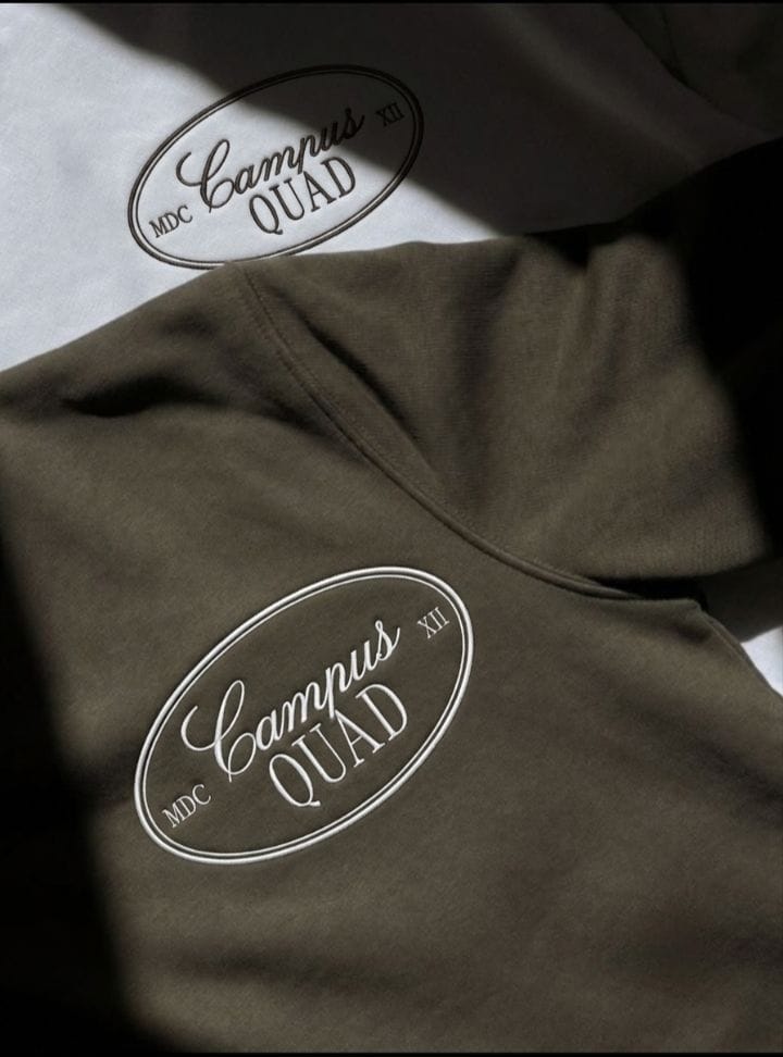 Campus Quad embroidered apparel in ivory and olive fabric