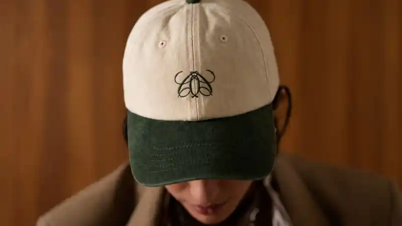 Campus Quad embroidered cap in cream and forest green